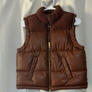 Maurice’s ‘leather” vest with Sherpa
